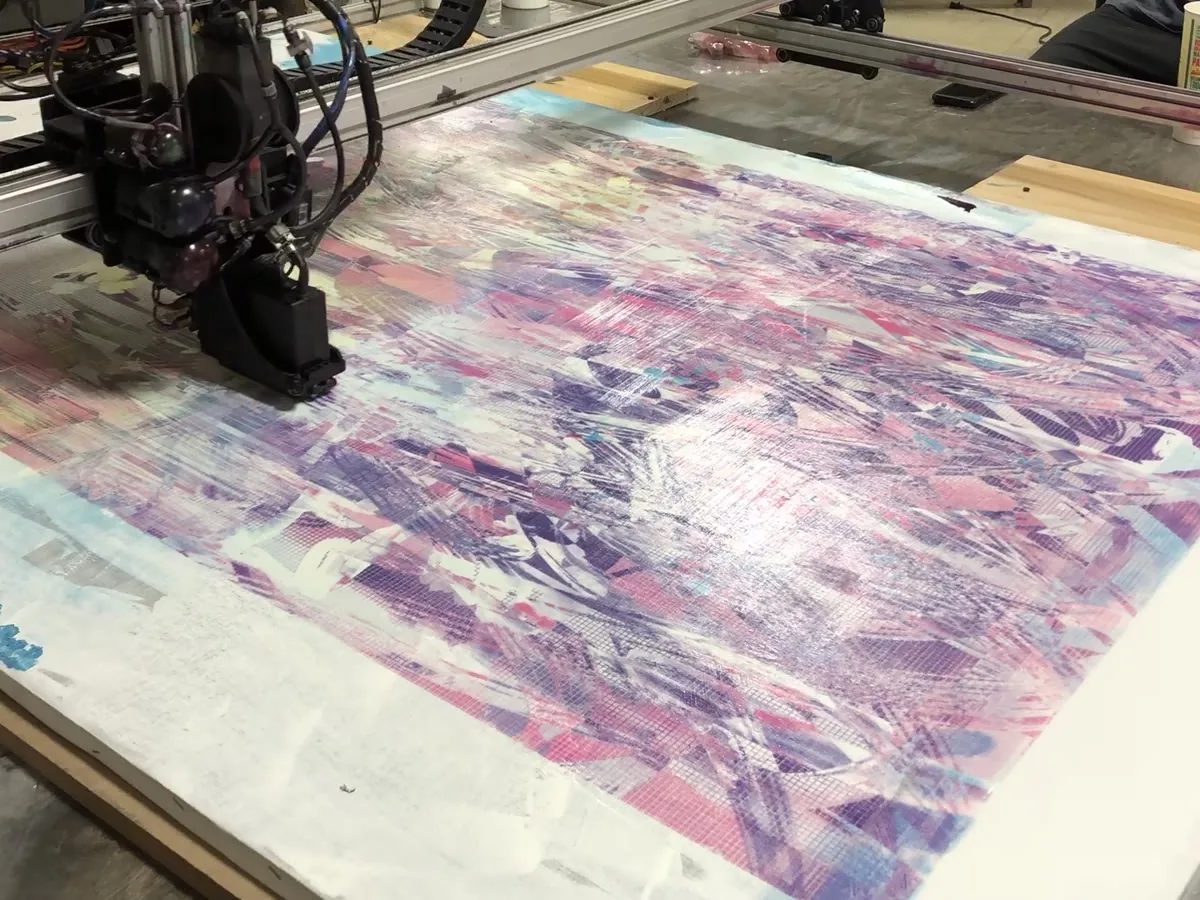A glossy work by Petra Cortright under a Matr print head